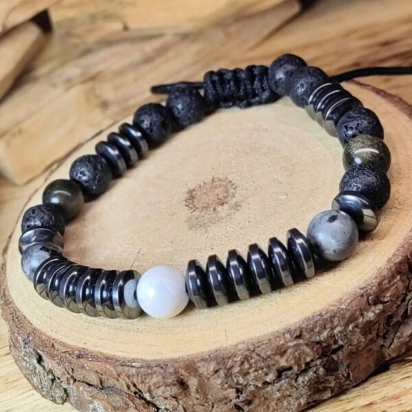 Brazalete negro gris
